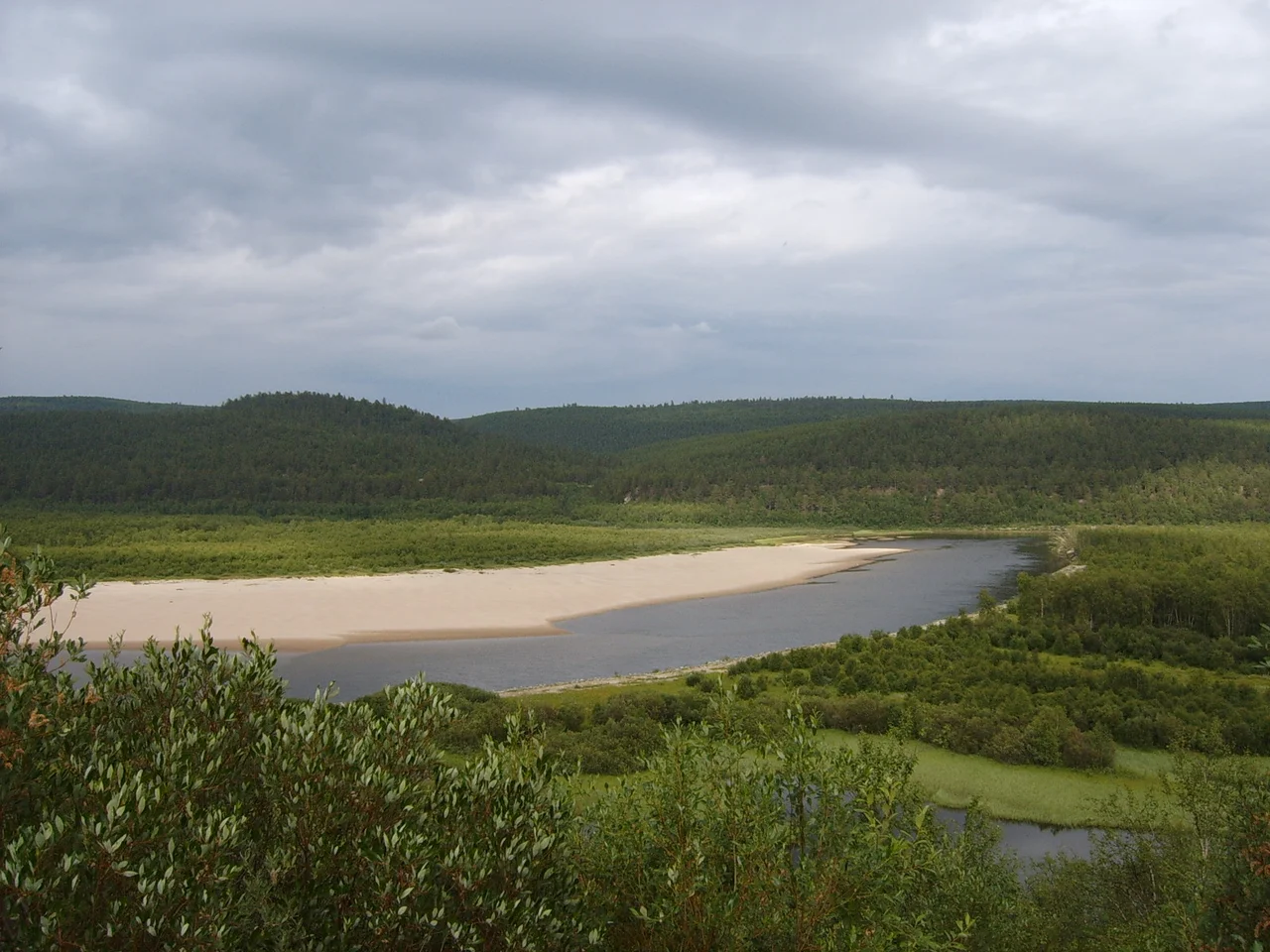 Frontier between Finland and Norway — east of Karasjok.

Taiga forests and Tana River.